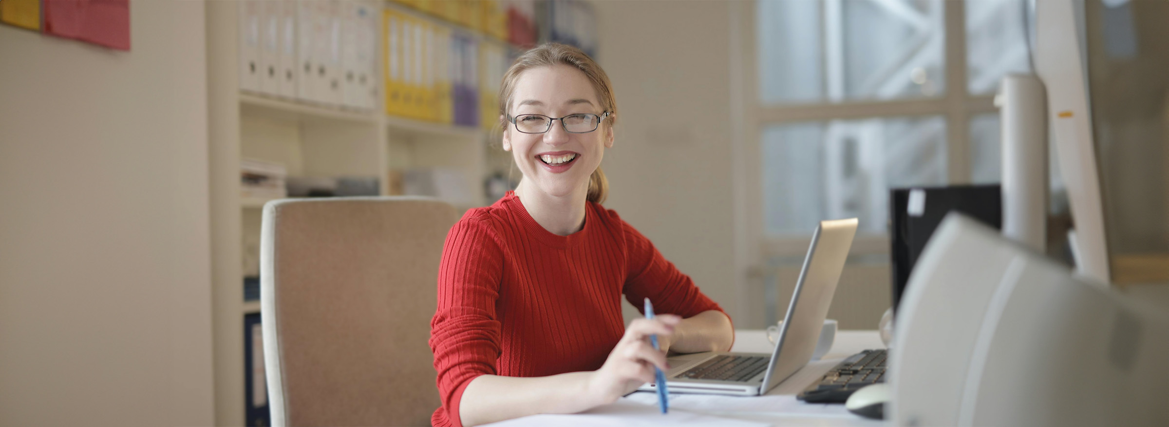 smiling-girl-in-red-sweater-filled