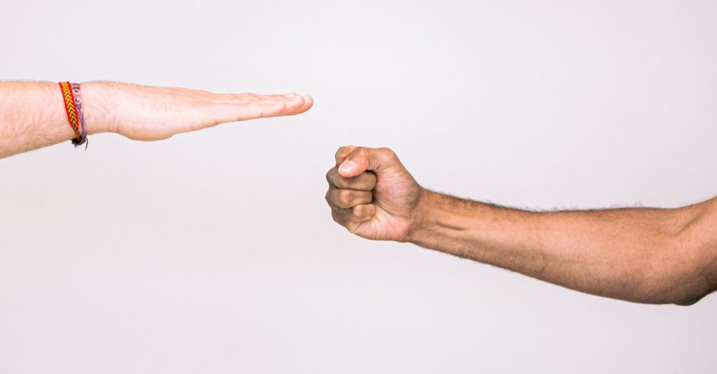 Conflict, depicted as rock paper scissors