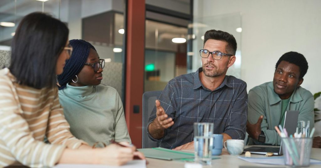 Manager working with employees